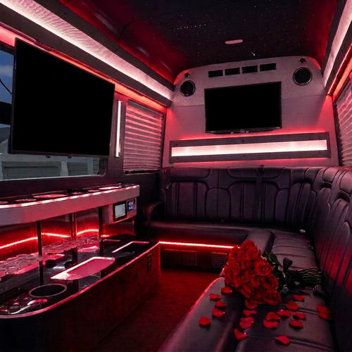 AI-edited party bus interior based on La Buena Vida bus photos, with roses on black leather seating, black TV screens, and softly red-tinted LED strips.